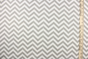 This printed flannel features a chevron pattern in grey and white.  Uses include apparel, bedding, pillows, home decor and crafting.  This fabric has a soft workable feel. 