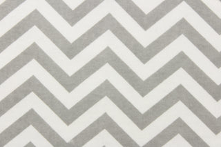 This printed flannel features a chevron pattern in grey and white.  Uses include apparel, bedding, pillows, home decor and crafting.  This fabric has a soft workable feel. 