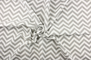 This printed flannel features a chevron pattern in grey and white.  Uses include apparel, bedding, pillows, home decor and crafting.  This fabric has a soft workable feel. 