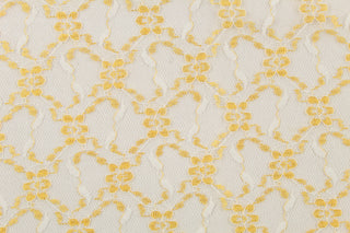 This lace features a woven floral design in golden yellow and white.