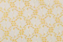 Load image into Gallery viewer, This lace features a woven floral design in golden yellow and white.
