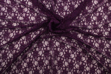 Load image into Gallery viewer, This lace features a woven floral design in a rich dark purple.
