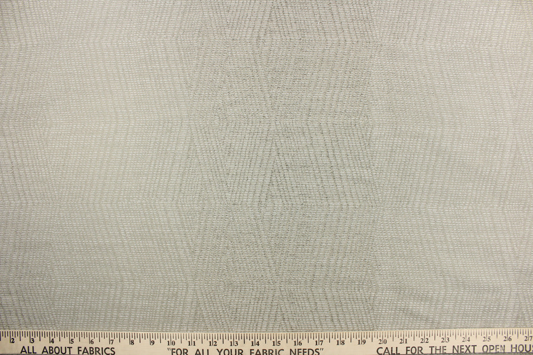 This duo tone jacquard fabric in sand would be a great accent to your home decor.  It has a textured feel with a nice soft hand.  Uses include bedding, accent pillows, cornice boards and drapery.  The possibilities are endless.