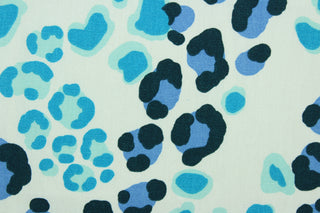 This fabric features a leopard print design in blue, aqua, teal and black on a white background.  The multi use fabric is perfect for window treatments, decorative pillows, custom cushions, bedding, light duty upholstery applications and almost any craft project.  It has a soft workable feel yet is stable and durable.  