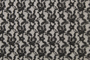 This lace features a small woven floral design in black .