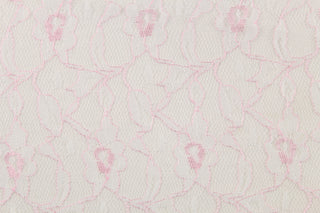  This lace features a woven floral design in light pink.