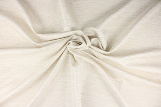 This multi-purpose mock linen in beach includes varying shades of light beige.  It has a soft feel with a subtle sheen.  It would be great for home decor, window treatments, pillows, duvet covers, tote bags and more.  We offer Seafarer in other colors.