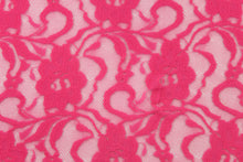 Load image into Gallery viewer, This lace features a woven floral design in bright pink.

