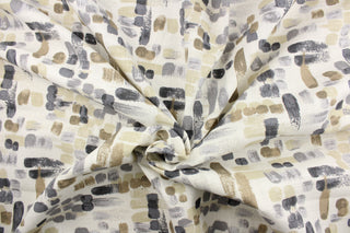 This fabric features an abstract design in shades of brown and gray on a off white background.  It it is perfect for window treatments, decorative pillows, handbags, light duty upholstery applications.  This fabric has a soft workable feel yet is stable and durable with 50,000 double rubs.  