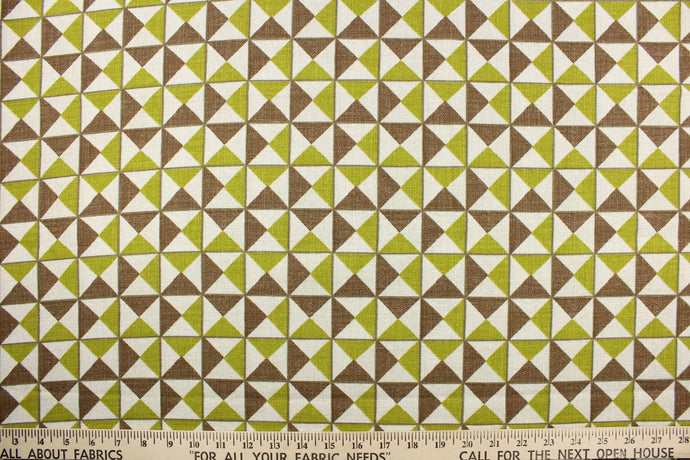 This fabric features a small scale geometric print in coca brown, celery green and off white.  It it is perfect for window treatments, decorative pillows, handbags, light duty upholstery applications.  This fabric has a soft workable feel yet is stable and durable with 50,000 double rubs.  