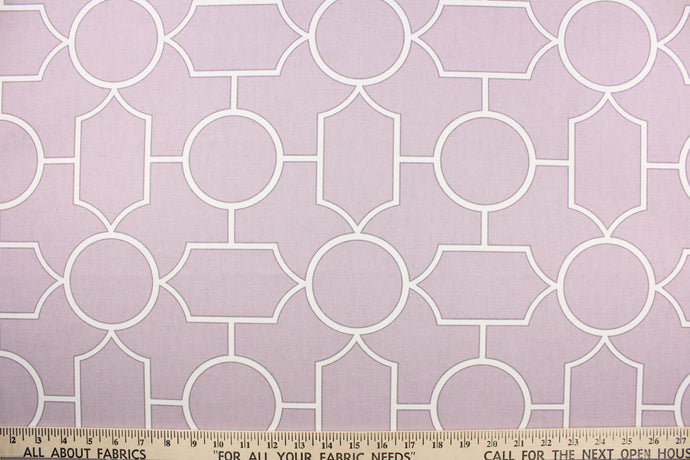 This fabric features a modern geometric design in lilac and white.  It it is perfect for window treatments, decorative pillows, handbags, light duty upholstery applications.  This fabric has a soft workable feel yet is stable and durable with 30,000 double rubs.  
