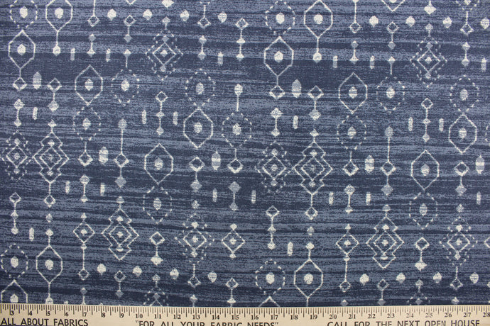 This fabric features an abstract design in navy blue and white.  It is perfect for window treatments, decorative pillows, handbags, light duty upholstery applications.  This fabric has a soft workable feel yet is stable and durable.