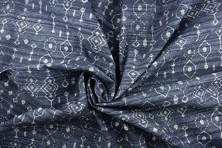 This fabric features an abstract design in navy blue and white.  It is perfect for window treatments, decorative pillows, handbags, light duty upholstery applications.  This fabric has a soft workable feel yet is stable and durable.