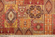 Load image into Gallery viewer, This ethnic patchwork design is printed on linen and viscose and contains the colors of orange, spice red, tan, gold and raisin.  It is perfect for window treatments, decorative pillows, handbags, light duty upholstery applications.  This fabric has a soft workable feel yet is stable and durable with 12,000 double rubs.  

