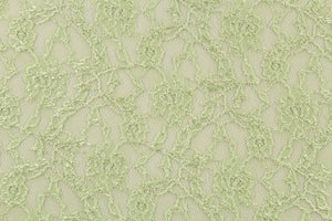  This lace features a woven floral design in light green .
