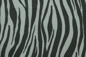 This fabric features striated stripes in gray and black.  The multi use fabric is perfect for window treatments, decorative pillows, custom cushions, bedding, light duty upholstery applications and almost any craft project.  It has a soft workable feel yet is stable and durable.  
