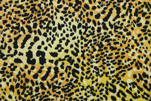 Load image into Gallery viewer, This fabric features an animal print design in brown, black and tan.  The multi use fabric is perfect for window treatments, decorative pillows, custom cushions, bedding, light duty upholstery applications and almost any craft project.  It has a soft workable feel yet is stable and durable.  
