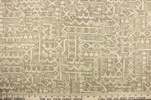 This fabric features a patchwork ethnic design in brown and off white.  The cotton and linen fabric was woven with basket weaves for more texture.  It is perfect for window treatments, decorative pillows, handbags, light duty upholstery applications.  This fabric has a soft workable feel yet is stable and durable with 27,000 double rubs.  