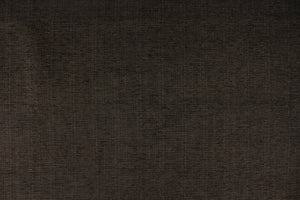 This high end upholstery weight fabric is suited for uses that requires a more durable fabric.  Colors included are brown and black with hints of dark gold and light blue.  The reinforced backing makes it great for upholstery projects including sofas, chairs, dining chairs, pillows, handbags and craft projects.  It is soft and pliable and would make a great accent to any room.