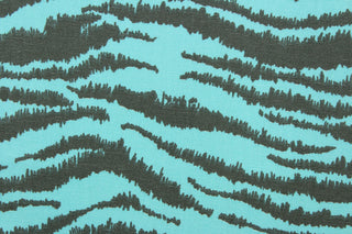 This fabric features striated stripes in aqua and gray.  The multi use fabric is perfect for window treatments, decorative pillows, custom cushions, bedding, light duty upholstery applications and almost any craft project.  It has a soft workable feel yet is stable and durable