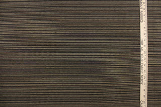 This high end upholstery weight fabric is suited for uses that requires a more durable fabric. The reinforced backing makes it great for upholstery projects including sofas, chairs, dining chairs, pillows, handbags and craft projects.  It is soft and pliable and would make a great accent to any room.  Colors included are dark brown, black and dark beige.