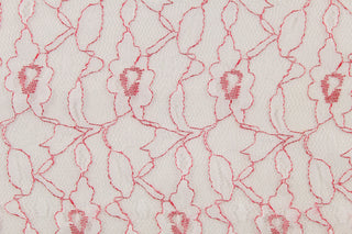 This lace features a woven floral design in white with red outline. 
