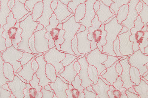 This lace features a woven floral design in white with red outline. 