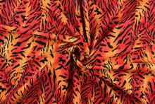 Load image into Gallery viewer, Verdant is an animal print design in vibrant orange, red and black.  The multi use fabric is perfect for window treatments, decorative pillows, custom cushions, bedding, light duty upholstery applications and almost any craft project.  It has a soft workable feel yet is stable and durable.  
