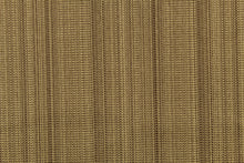 Load image into Gallery viewer,  A mock linen in golden tan with hints of brown and a latex backing.
