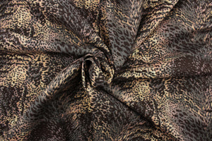 Aquatic features a reptile skin design in dark gray and peach.  The multi use fabric is perfect for window treatments, decorative pillows, custom cushions, bedding, light duty upholstery applications and almost any craft project.  It has a soft workable feel yet is stable and durable.  