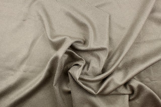 A mock linen in a shimming taupe gray . 