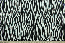 Load image into Gallery viewer,  This fabric features striated stripes in black and white.  The multi use fabric is perfect for window treatments, decorative pillows, custom cushions, bedding, light duty upholstery applications and almost any craft project.  It has a soft workable feel yet is stable and durable.  
