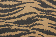 Load image into Gallery viewer, This fabric features striated stripes in mocha and brown.  The multi use fabric is perfect for window treatments, decorative pillows, custom cushions, bedding, light duty upholstery applications and almost any craft project.  It has a soft workable feel yet is stable and durable.  

