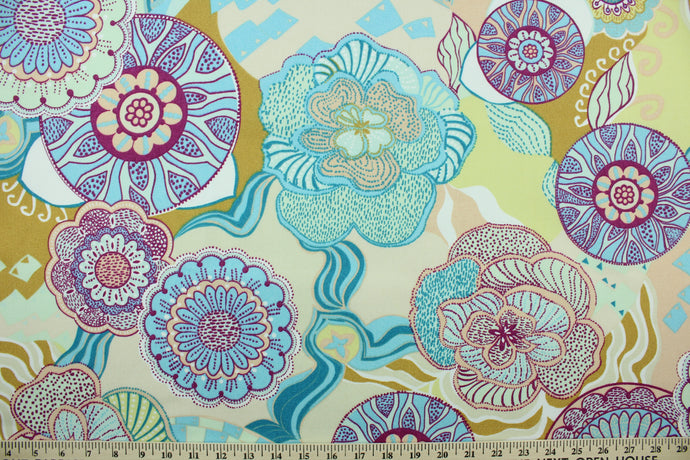 Flower Child is a large medallion flower print that is perfect for outdoor settings or indoors in a sunny room.  This multi use fabric features a water and stain resistant finish.  Uses include decorative pillows, cushions, chair pads, tote bags and upholstery.  Colors included are purple, apricot, turquoise, light blue, yellow, gold and white.