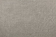 Load image into Gallery viewer, A mock linen in a true gray with a tricot backing. 
