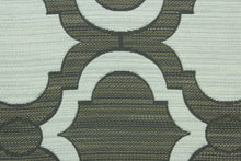 Load image into Gallery viewer, This fabric features a geometric design in gray, tan and off white . 
