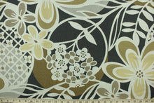 Load image into Gallery viewer, This fabric features a floral design in gold, dark gray, tan and pale beige with a latex backing.

