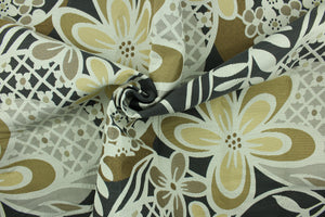 This fabric features a floral design in gold, dark gray, tan and pale beige with a latex backing.
