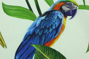 This fabric features vibrant parrots in blue, red, orange, green, black, white, yellow and brown . 