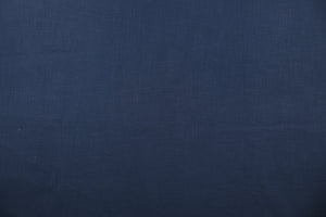 A mock linen in a rich blue with a cotton scrim interlining . 