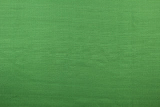  A mock linen in a rich green with a cotton scrim backing