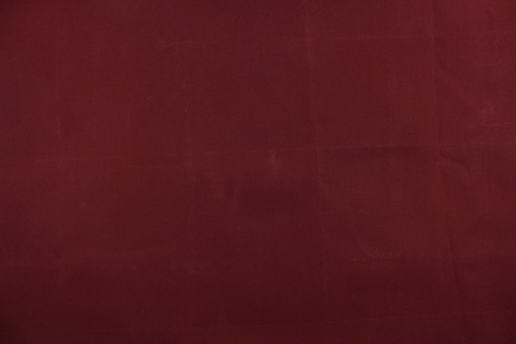  A solid burgundy fabric great for umbrellas, outdoor upholstery and more.