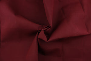  A solid burgundy fabric great for umbrellas, outdoor upholstery and more.