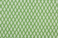 Load image into Gallery viewer, This fabric features a diamond design in green and white with hints of golden yellow. 
