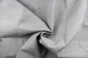 A solid light gray  fabric great for umbrellas, outdoor upholstery and more.
