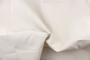 A solid very pale beige fabric great for umbrellas, outdoor upholstery and more. 