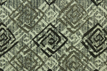 Load image into Gallery viewer,  This fabric features a geometric design in  gray, black, taupe and beige with a latex backing.
