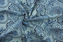 Load image into Gallery viewer, This fabric features a paisley design in shades of blue and cream .
