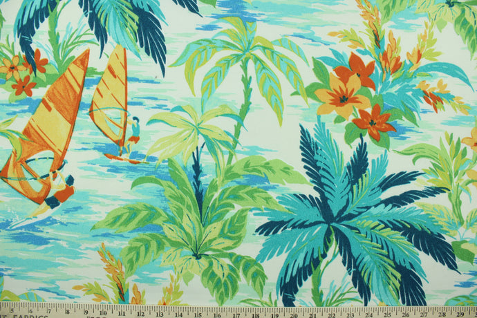 This outdoor fabric features a tropical floral design in orange, green, turquoise, teal, and white.