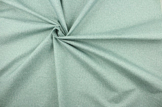 This 2-pass blackout lining in seafoam green is used to keep rooms cooler in the summer and warmer in the winter.  The fabric lining adds fullness to your window treatments.  It is light weight and easy to sew and simple to maintain.